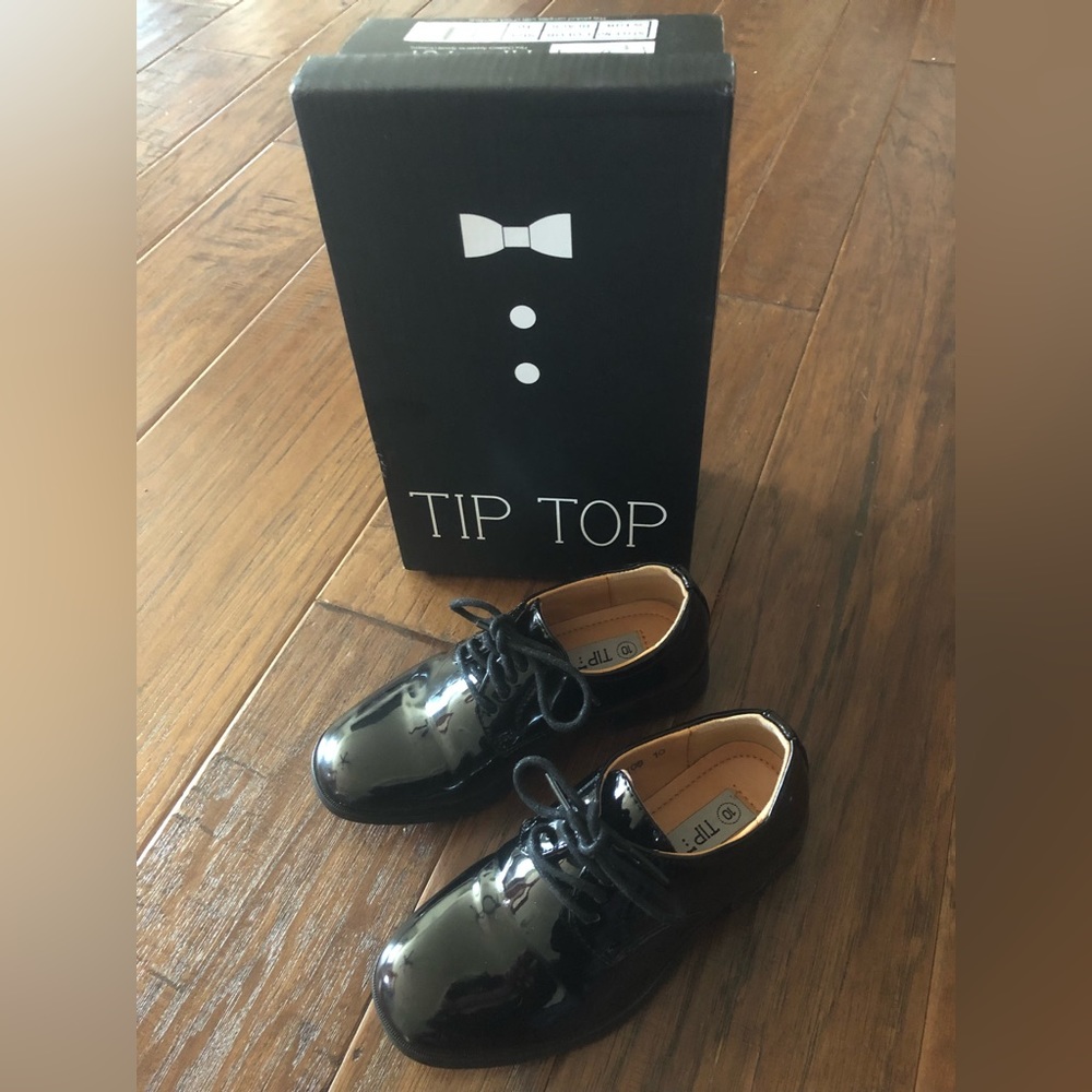 Tip Top little boys black dress shoes.